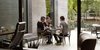 Modern home with Outdoor, Back Yard, and Shrubs. Shaded by an awning from TSM Systems and furnished with Sol y Luna pieces from Design Within Reach, the rear patio is a favorite spot for meals. Photo of Wessel Residence