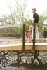 Modern home with Ceiling Lighting, Concrete Floor, Den Room Type, Concrete Counter, Chair, Shelves Storage Type, Outdoor, Back Yard, and Decking Patio, Porch, Deck. Addison stands on the deck of the bowl above graffiti art by Lalo Cota. Photo 12 of Wessel Residence