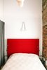 Modern home with Bedroom and Bed. A bedroom next to the living area has an overhead lantern Max made by wrapping string soaked in glue, water, and corn starch around an inflated balloon, deflating it, and then lining it with rice paper-mache. Photo 10 of Max's Apartment