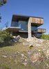 Modern home with Exterior and House. The charred-wood facade on Silping Wong and Jon Friesen’s house in western Canada was hand-done by Jon and his father. They used Douglas fir, a thick, corky wood that is local to the region. Photo 2 of Friesen-Wong Residence