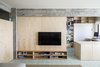 Modern home with Living Room, Bookcase, Media Cabinet, Storage, Desk, and Ceramic Tile Floor. The living room is defined by a large birch plywood television console, designed by architect, Miguel Marcelino.
-
Lisbon, Portugal
Dwell Magazine : July / August 2017 Photo 4 of The Henriques/Moreira Residence