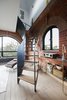 Modern home with Chair, Light Hardwood Floor, Console Tables, Staircase, Metal Railing, and Wood Tread. Littlehampton Welding made the steel staircase on the third floor. Photo 5 of Lister Tower