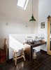 Modern home with Bath Room, Vessel Sink, and Pendant Lighting. The bathroom occupies the highest chamber of the tower. A vintage pendant purchased from Skinflint Design hangs above a copper sink by William Holland. Photo 7 of Lister Tower
