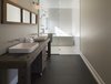 Modern home with Bath Room, Wood Counter, Open Shower, Freestanding Tub, and Vessel Sink. The master bathroom features sinks and fixtures by Kohler. The tub is by Aktuell.
-
North Hatley, Quebec
Dwell Magazine : July / August 2017 Photo 9 of Townships Farmhouse
