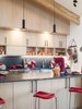 Modern home with Kitchen, Ceiling Lighting, Drop In Sink, Range, and Wood Cabinet. The kitchen cabinets hold dishes by Butterpie Productions.
-
Taos, New Mexico
Dwell Magazine : July / August 2017 Photo 5 of Rodin Residence