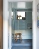 Modern home with Bath Room and Enclosed Shower. In the downstairs bathroom, the semigloss wall tile is from Daltile. Photo 9 of Hill-Heiserman House