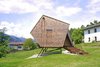 Modern home with Exterior, Cabin Building Type, Wood Siding Material, and Shingles Roof Material. Because of its irregular, otherworldly form, and how it seems to be suspended in midair, the cabin was named "Ufogel," which is a melding of the acronym UFO and "vogel," meaning bird in German. Photo of Ufogel