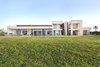 Modern home with Outdoor, Swimming Pools, Tubs, Shower, Grass, and Back Yard. The resort-like atmosphere of the home set on a two acre garden, is magnified by the stunning indoor-outdoor pool. Photo 2 of Amizmiz House