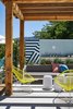 Modern home with Outdoor, Concrete Patio, Porch, Deck, Trees, Back Yard, and Raised Planters. An outdoor relaxation area also offers a "mix your own" mud bar. Photo 8 of Calistoga Motor Lodge and Spa