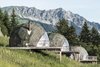 Modern home with Exterior, Cabin Building Type, Prefab Building Type, Dome RoofLine, Glass Siding Material, and Tent Building Type. Upon check-in, guests receive their very own backpack with a map, headlamp, and walking sticks to ensure a full Alpine experience. The pods are located an easy 15-minute hike from reception—so, packing your hiking boots is essential.
In addition to hiking, Whitepod also offers dog sledding, paragliding, and and private ski slopes for Whitepod guests only. After skiing, guests can enjoy Whitepod's sauna, indulge in spa services, or dine at their in-house restaurant called Les Cerniers, which serves a selection of seasonal traditional mountain dishes. Photo of Whitepod Eco-Luxury Hotel