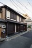 Modern home with Exterior, House Building Type, Tile Roof Material, Flat RoofLine, and Glass Siding Material. The BenTen Residences by Shimaya Stays is a 1,650-square-foot machiya that's been restored and split into two apartments that measure around 800 square feet each. Photo 3 of BenTen Residences