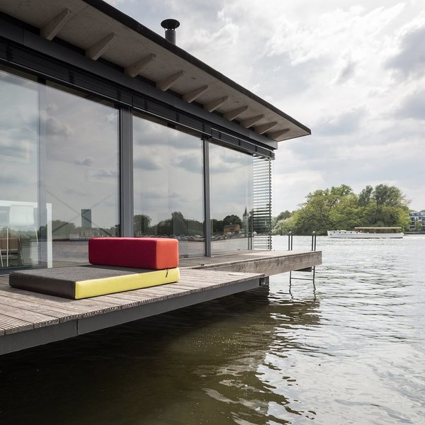 Measuring approximately 646 square feet with minimalist interiors designed by Chris Laugsch, the home is furnished with sleek custom-made pieces that don’t distract from the property's views.