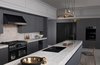 Modern home with Kitchen, Range, Range Hood, Cooktops, Marble Counter, and Pendant Lighting. Dacor’s truefit integration combined the modern look of graphite stainless steel is designed to seamlessly blend in with a wider range of cabinetry. Photo of The Modernist Collection by Dacor