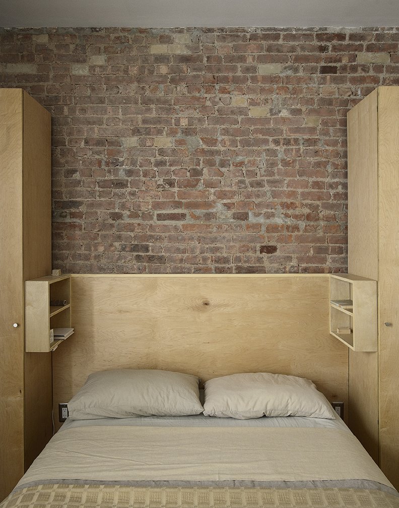Photo 18 Of 19 In This Compact Apartment Nyc Is Full Crafty Bedroom Bed And Shelves In The Master Top Of Platform