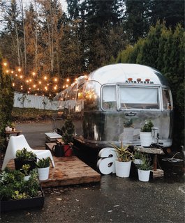 An ambitious couple's DIY overhaul of a decrepit 1971 Airstream Sovereign—purchased for less than $5,000—creates an airy retreat that feels much larger than its 200 square feet.