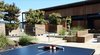 Outdoor ping pong and common area. Photo 7 of Timber Cove Inn modern home