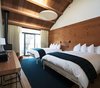 Forrest View Room. Redwoods, Pines and Eucalyptus are your neighbors, located within the main building surrounding the Great Room, offering a handcrafted bed and redwood deck. Photo 4 of Timber Cove Inn modern home