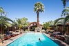 Modern home with Outdoor, Trees, Back Yard, Large Pools, Tubs, Shower, Large Patio, Porch, Deck, Hot Tub Pools, Tubs, Shower, and Stone Patio, Porch, Deck. Sparrows Lodge in Palm Springs, California Photo of Sparrows Lodge