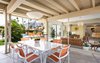 Modern home with Outdoor, Concrete Patio, Porch, Deck, Side Yard, Trees, and Grass. Del Marcos Hotel in Palm Springs, California Photo of Del Marcos Hotel