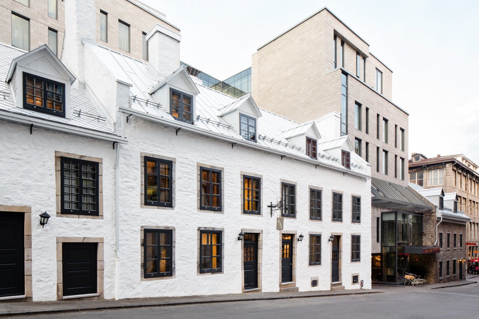 The innovative, inspired Old Montréal hotel overlooks Place Jacques-Cartier and incorporates a contemporary glass structure with two historical buildings – Maison Edward-William-Gray and Maison Cherrier – dating back to the 18th century.