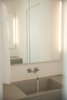 Modern home with Bath Room, Wall Lighting, and Drop In Sink. Each bathroom was thoughtfully designed and stocked with products by TSF Botanicals and Carbon & Crane. Photo 8 of The Brexley