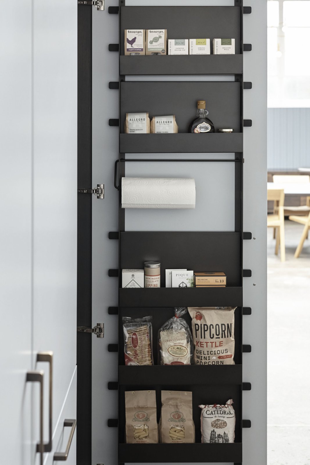 The Interior Component’s back-of-door rack can be configured with a combination of shelves and rods.