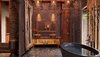 Modern home with Bath Room, Pendant Lighting, Vessel Sink, and Soaking Tub. The Clay Pool Cottages were designed to embody the culture of Keemala's Pa-Ta-Pea (Earth) Clan, which consisted of farmers, fishermen, carpenters, blacksmiths, and miners. Photo 6 of Keemala