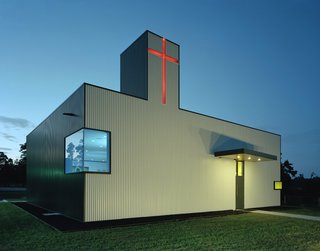 Marlon Blackwell Architects converted a generic shop building in Springdale, Arkansas, into the St. Nicholas Eastern Orthodox Church. Grounding the structure to its roots, parts of the existing building are left exposed, while the exterior skin of box rib metal panel is a nod to local, industrial forms.