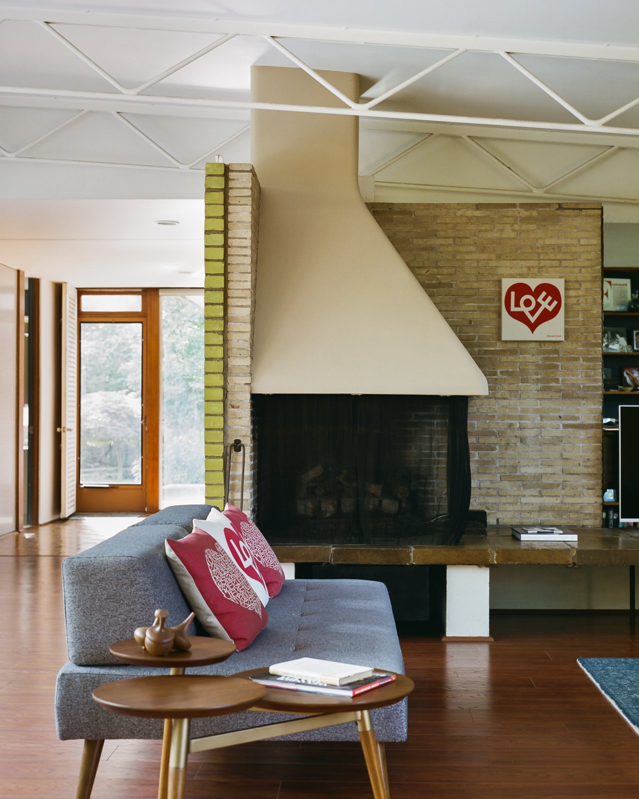 conversation pit living room on Photo 1 Of 158 In Living Corner Photos From This Michigan Couple Found Out They Own The Last Standing Home By Alexander Girard Dwell