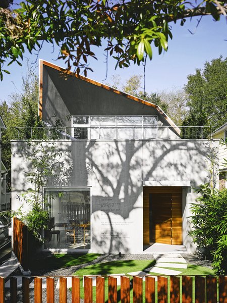 The transformation of  a 1950s eyesore into an elegant, gallery-like home was a creative challenge for architect Kevan Hoertdoerfer and all involved. The poem 