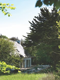 Kayaks wait to take the homeowners on an outdoor adventure.