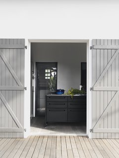The Vipp kitchen is raised on legs for easy cleaning.