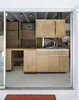 The kitchen cabinets are original. Photo 17 of The Ellison House modern home