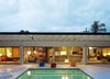 Modern home with Outdoor, Large Pools, Tubs, Shower, and Back Yard. The three Left-Twist Cube's are by Frank Gehry. Photo of The Ellison House