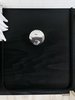 A Croma showerhead by Hansgrohe is mounted from a section of ceiling that was stained black; the U-shaped curtain track is an IKEA hack. Photo 18 of Elsewhere Cabin Retreat modern home