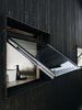Modern home with Exterior and Wood Siding Material. A Milgard awning window provides ventilation. Photo 19 of Elsewhere Cabin Retreat