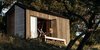 Modern home with Exterior, Tiny Home Building Type, Wood Siding Material, Metal Roof Material, Cabin Building Type, and Gable RoofLine. Elsewhere Cabin by Sean O'Neill Photo of Elsewhere Cabin Retreat