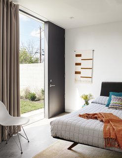 Best 60 Modern Bedroom Concrete Floors Design Photos And Ideas Dwell A Fence Made Of Concrete Masonry Units And Wood Provides Mike Dana With Secluded