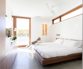 Thanks to the efficiency of the bedroom fans by The Modern Fan Co., the Turkels can keep the Marvin lift-and-slide doors open throughout much of the year without having to rely on air conditioning. "We want to be able to keep the doors open as much as possible, yet sometimes the air movement in the desert isn’t sufficient to counteract the heat, so the fans are really a must," adds Meelena.