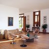 Modern home with Living Room, Sofa, Coffee Tables, Chair, and Medium Hardwood Floor. Mama Ruisa Boutique Hotel in Rio de Janeiro, Brazil Photo of Mama Ruisa Boutique Hotel