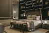 Modern home with Bedroom, Bed, Rug Floor, Night Stands, Table Lighting, Dark Hardwood Floor, and Bench. The "Suleiman" room, on the ground floor, nods to Africa through touches like the traditional woven baskets peppering the expansive bookshelves. Photo 5 of Torel 1884 Suites & Apartments