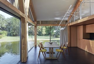 The interiors feature larch glulam beams accented by Douglas fir plywood paneling.