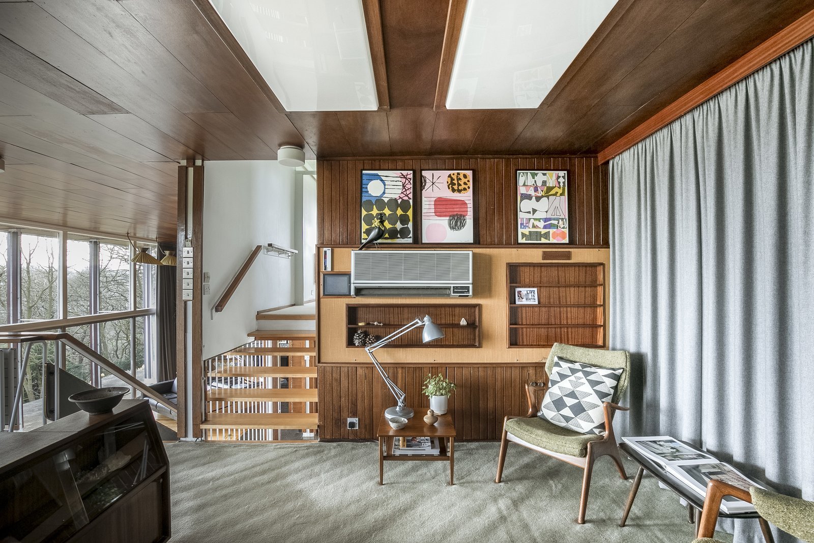 In the study, an Anglepoise lamp complements the custom drapes by Moon Fabrics.
