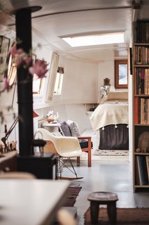 Between the living room and bedroom there is a large, timber-framed skylight, creating the perfect place for growing plants. 