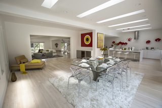 The former home suffered from years of incongruous additions and renovations. The architects strategically reconfigured the layout to achieve a cohesive, open interior.