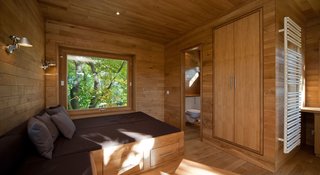 "The interior and exterior surfaces can be left untreated or oiled, waxed, varnished, or painted," says Wenning. "There is a wide range of ecologically harmless products available. The interiors can also consist of natural insulation materials such as wood fiber boards, sheep wool mats, or coconut fibers."