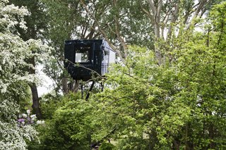 A peek at the reflective tree house known as Black Beauty.