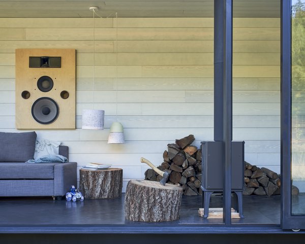 Ryan Johnston, a longtime collaborator of Patrick’s, designed and built the sound system. The stove is by Morsø; the sectional is from IKEA.