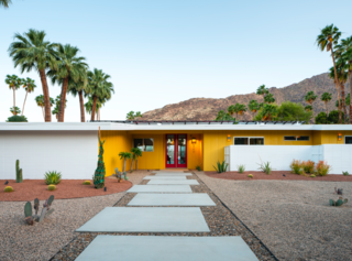 A yellow facade adds character and curb appeal.