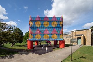 The popular Dulwich Pavilion returns with The Colour Palace, a dazzling 32-foot cube created by designer Yinka Ilori and architecture studio Pricegore.